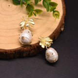 pearly golden bee earrings