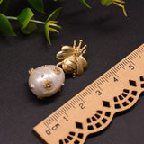 pearly golden bee earrings